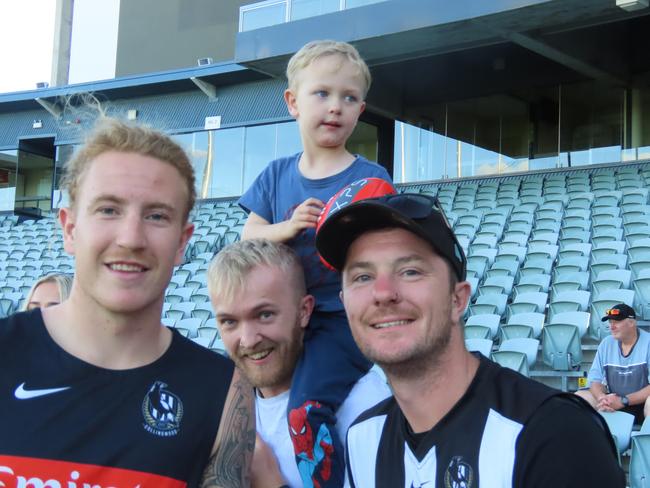 Elijah Hall, Shane Hudson and Curtis Hall with Collingwood player Beau McCreery. Picture: Jon Tuxworth