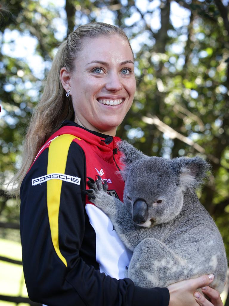 Angelique Kerber holding a koala, Australian and German tennis players at the Fed Cup draw, Lone Pine, St. Lucia. Photo: Liam Kidston.