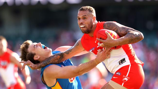 Lance Franklin fends off Charlie Ballard on Saturday.