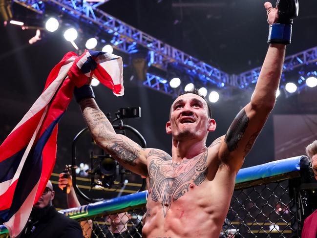 LAS VEGAS, NEVADA - APRIL 13: Max Holloway reacts to defeating Justin Gaethje in their BMF title fight at T-Mobile Arena on April 13, 2024 in Las Vegas, Nevada. (Photo by Carmen Mandato/Getty Images)