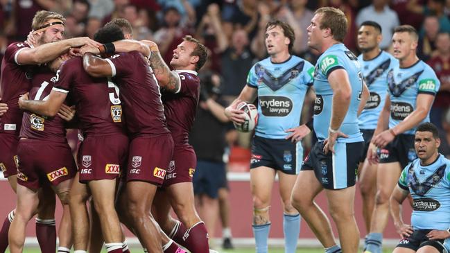 Harry Grant scores for the Maroons. Picture: Peter Wallis