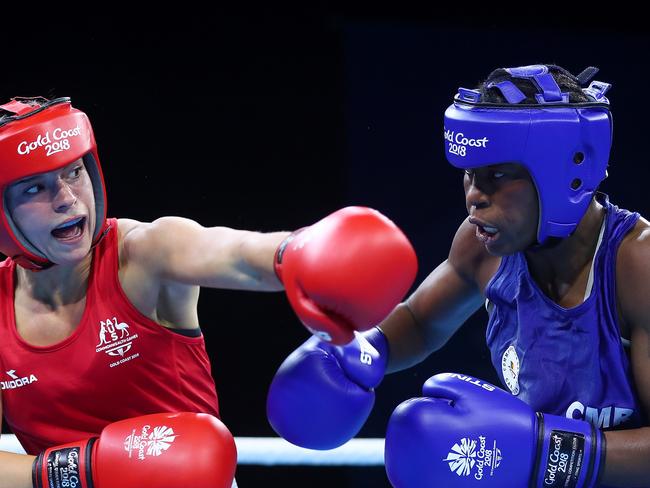 Christelle Aurore Ndiang of Cameroon, right, fought Australia’s Skye Nicolson in the Women's 57kg Quarterfinal Boxing on the Gold Coast before she vanished. Picture: Chris Hyde/Getty Images