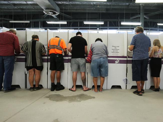 Cairns residents cast their vote in the 2016 Federal election at the pre polling booths set up at DFO shopping centre in Westcourt. General generic, stock photo of people voting. BRENDAN RADKE