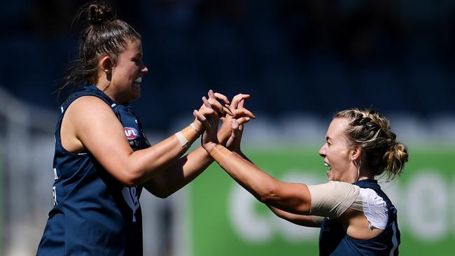 Bella Ayre celebrates a goal with Lauren Arnell. Picture: AAP Images