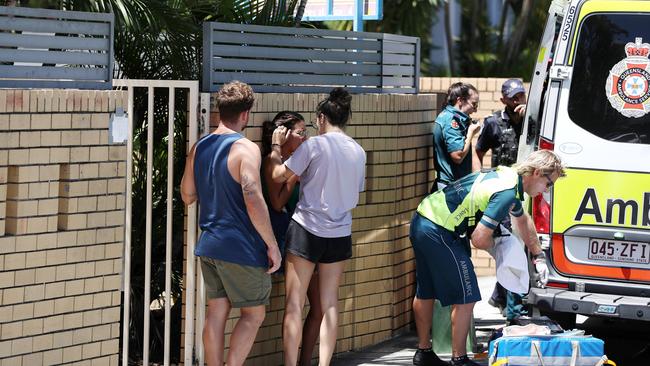 Tourists being comforted. Picture: NIGEL HALLETT