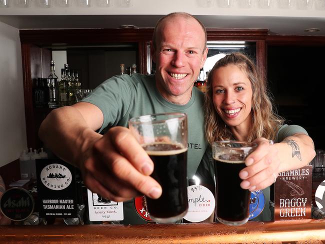 Paul Stewart and Sarah James bar staff at the Crescent Hotel that has re-opened in North Hobart.  Picture: NIKKI DAVIS-JONES