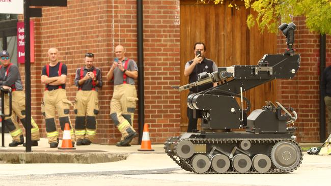 The bomb squad at work at AMDA in Mackay St, North Geelong after a suspicious package was delivered. Picture: Alison Wynd