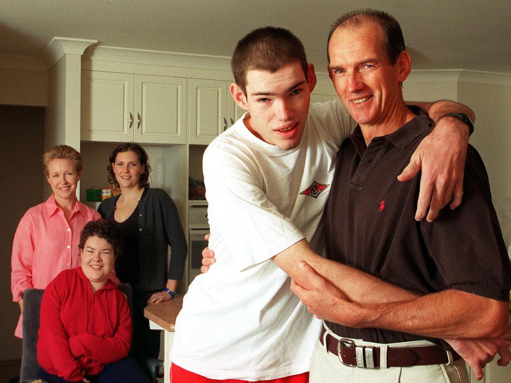 Wayne Bennett in 1999 with son Justin and (rear, from left) wife Trish and daughters Katherine and Elizabeth