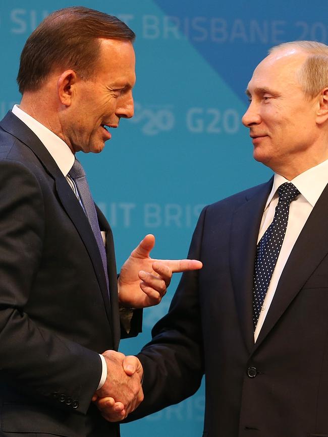 Tony Abbott greets Vladimir Putin in 2014