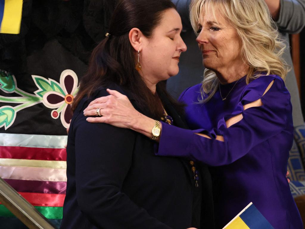 Ukrainian Ambassador to the United States Oksana Markarova (L) is embraced by First Lady Jill Biden. Picture: AFP