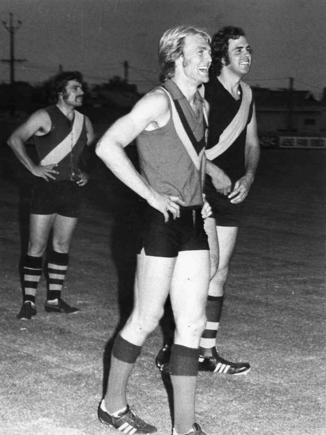 Footballer Graham Cornes (l) with Peter Carey at Glenelg 24 Mar 1977.