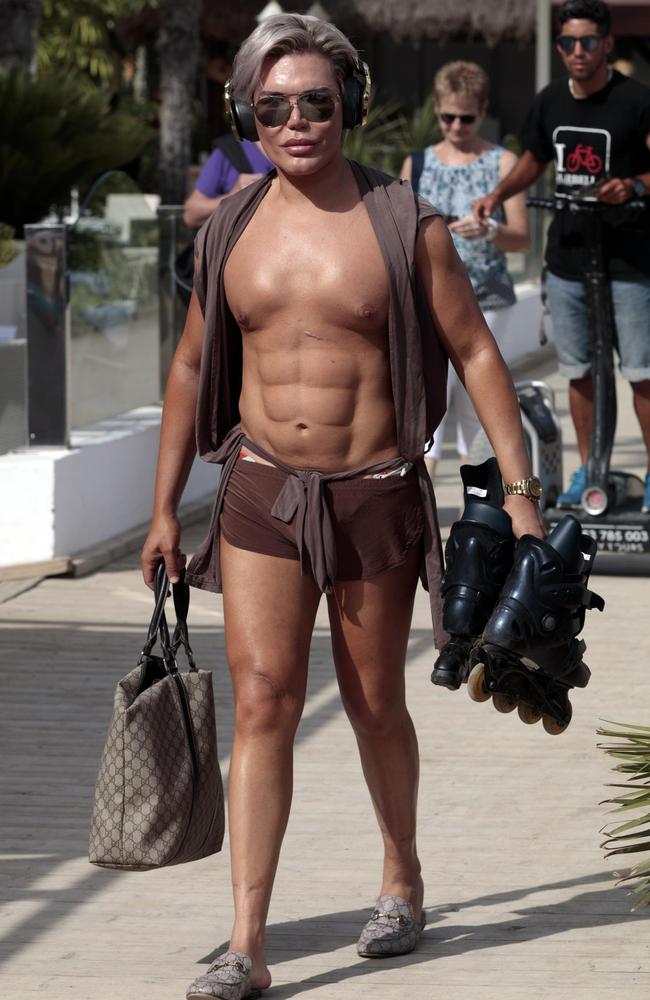 Human Ken doll Rodrigo Alves fake eight pack abs in Spain Photos