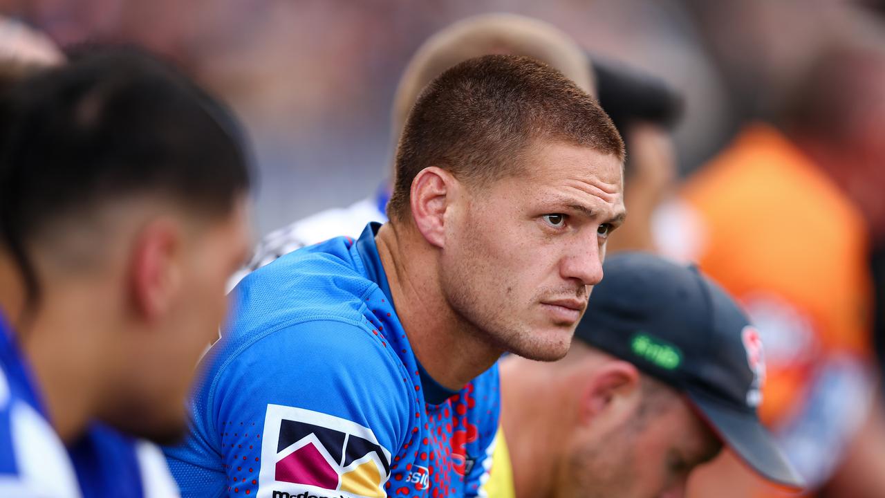 Kalyn Ponga watches on from the sideline after getting knocked out against Wests Tigers.