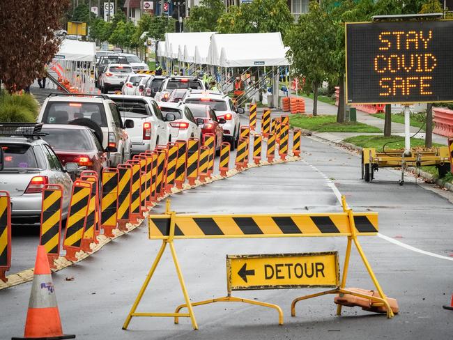 Herald Sun - Albury NSW - Friday 18th Sept 2020Police and military checking people entering into NSW from Victoria near the Victorian NSW border in Albury.Picture: Simon Dallinger.