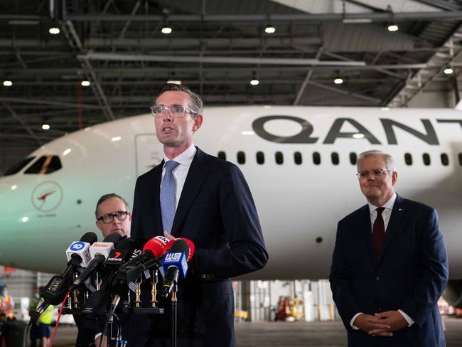 NSW Premier Dominic Perrottet, Scott Morrison and Qantas CEO Alan Joyce announce Qantas will begin international flights. Picture: NCA NewsWire/Bianca De Marchi