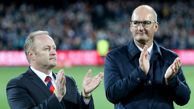 Adelaide’s Rob Chapman and Port Adelaide’s David Koch. Picture: Calum Robertson