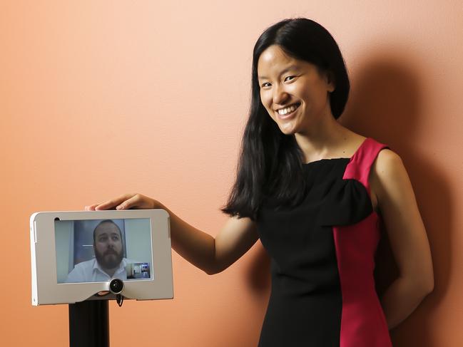 Qweekend - Young scientist Marita Cheng with her robot Bob. Pic taken at the RWBH. Pic Mark Cranitch.