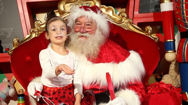 Santa with Layla at Chirnside Park Shopping Centre in Chirnside Park. Picture: Hamish Blair