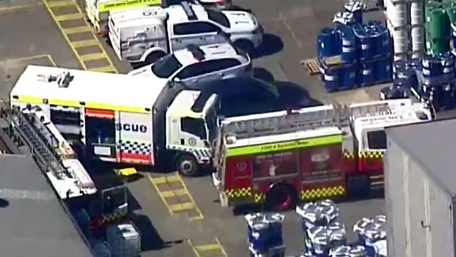 Emergency services at the scene at the DIC Corporation manufacturing plant in Auburn. Picture: 7News