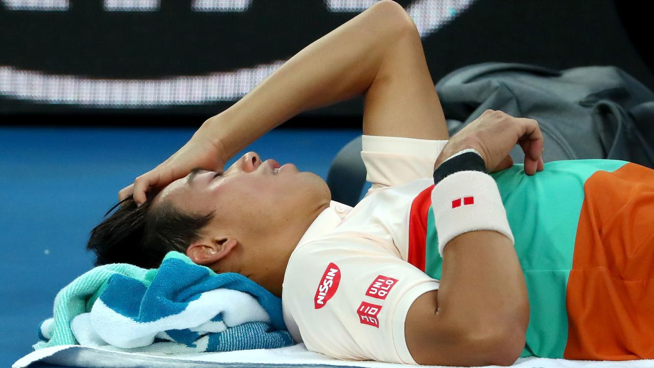 Kei Nishikori has retired hurt. (Photo by Michael Dodge/Getty Images)