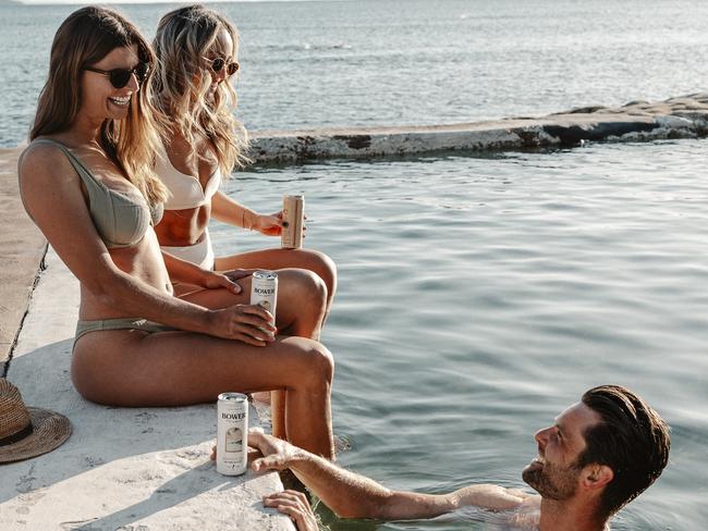 Fans of the new alcoholic kombucha at the Fairy Bower sea pool. Northern beaches' entrepreneurs Emlyn Gavin and Oliver Budniak have started their BOWER brewing business and launched an alcoholic drink called "Hard Kombucha". They say they wanted to reflect the local active beachside lifestyle. Picture: DANIELLE NIEUWENDYK