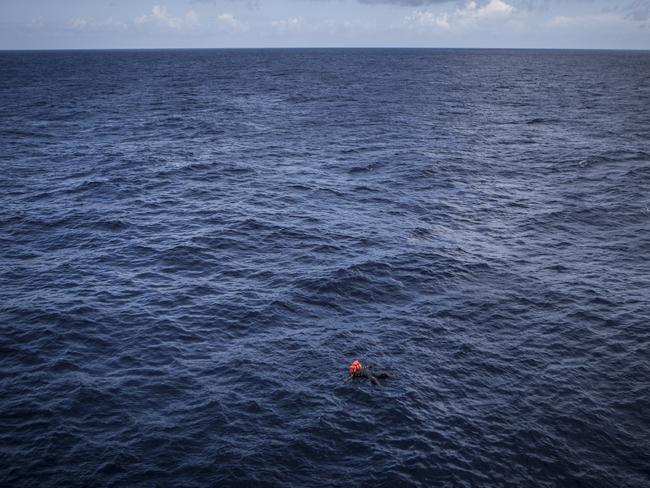 Spot News - Third Prize, Stories Picture: Mathieu Willcocks Title: Mediterranean Migration The body of a migrant found floating at sea. Red Cross medical staff onboard the Responder estimated he had been at sea for at least four days. The central Mediterranean migration route, between the coasts of Libya and Italy, remains busy. According to reports by the UNHCR, 5,000 people died while attempting to cross the Mediterranean in 2016.