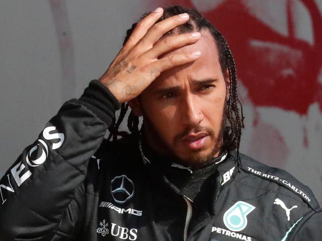 Mercedes' British driver Lewis Hamilton is seen after the F1 70th Anniversary Grand Prix at Silverstone on August 9, 2020 in Northampton. - The race commemorates the 70th anniversary of the inaugural world championship race, held at Silverstone in 1950. (Photo by Frank Augstein / POOL / AFP)