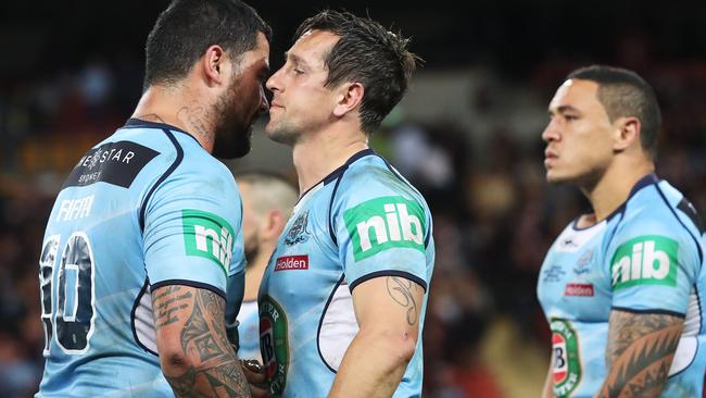 Andrew Fifita and Mitchell Pearce console each other after NSW’s Origin series loss.