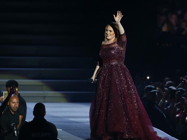 Adele stunned in a maroon gown. Picture: Paul Kane/Getty Images