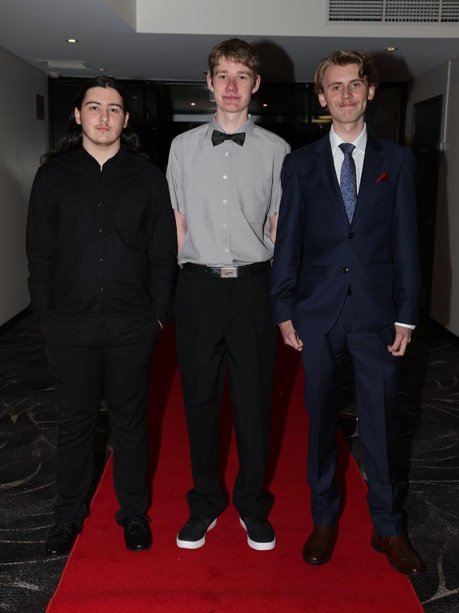 MELBOURNE, AUSTRALIA – JUNE 14 2024 Lucas Laidlaw, Jayden Ling and Owen Lee attend the Lowanna College Senior Formal 2024 at the Moe Racing Club Picture: Brendan Beckett