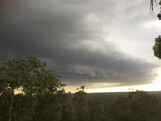 A severe thunderstorm lashed the Gold Coast and northern New South Wales this afternoon and into the evening. While the rain and hail sent most people diving and running for cover, some budding photographers snapped away at the dark cloud formations. This photo was taken by Dean Tunley