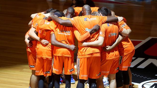 Taipans have each others back before tip off. PICTURE: STEWART McLEAN.