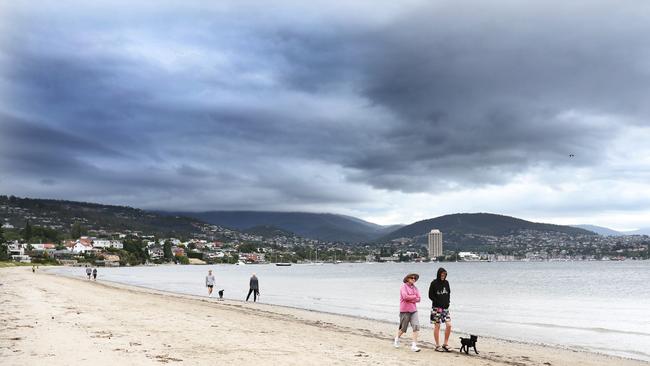 People on Nutgrove Beach at Sandy Bay. Picture: NIKKI DAVIS-JONES