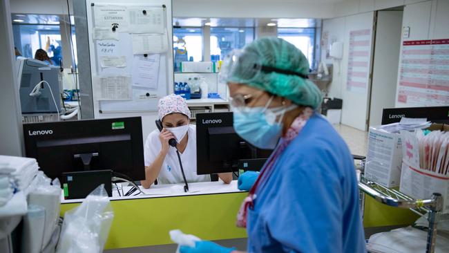 Intensive care workers in Spain, where the milder for most but still highly contagious Omicron variant has filled beds and exhausted staff. Picture: AFP