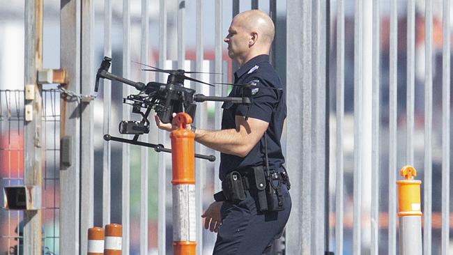 Police on Station Pier with a drone. Picture: Sarah Matray