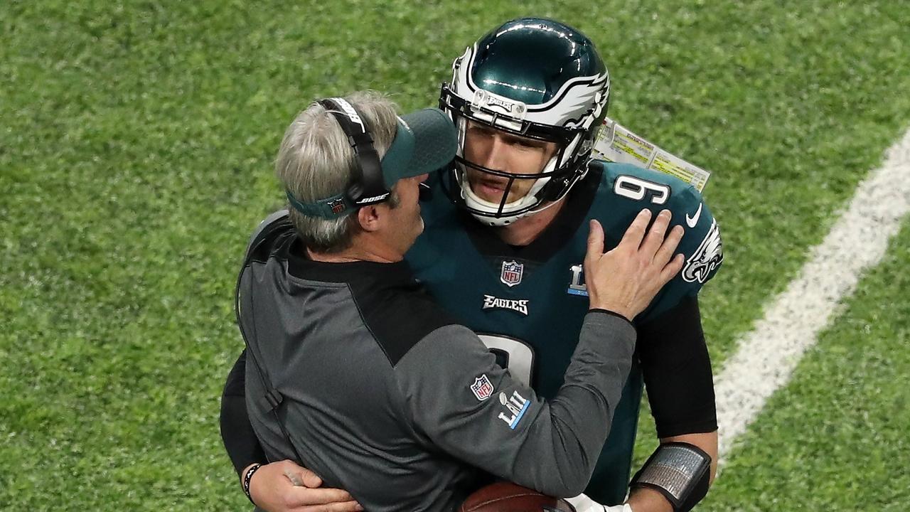 Philadelphia Eagles coach Doug Pederson hugs quarterback Nick Foles during their 2018 Super Bowl win.