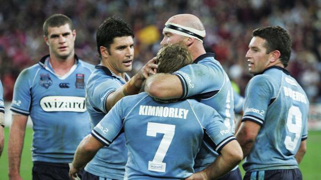 Teammates rush to comfort Kimmorley after his 2005 Origin error.