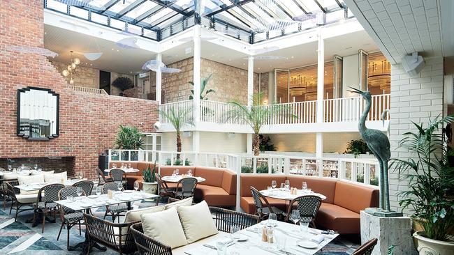 The airy Atrium restaurant. Picture: Kris Paulsen &amp; Greg Elms.