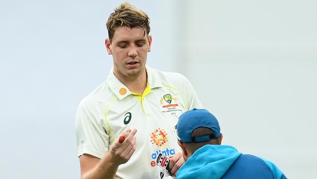 Cameron Green has his finger checked during the Boxing Day Test. Picture: Getty Images