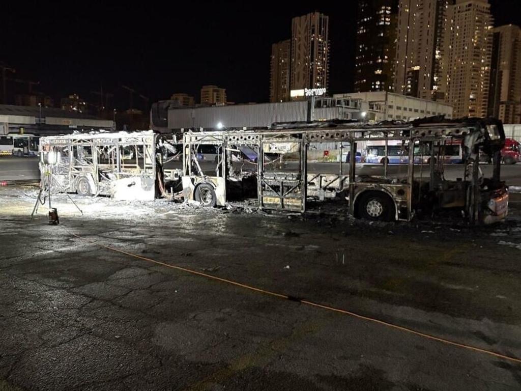 Israeli police inspect the scene of one of a series of bus explosions in Bat Yam, central Israel. Picture: Israel Fire and Rescue Authority