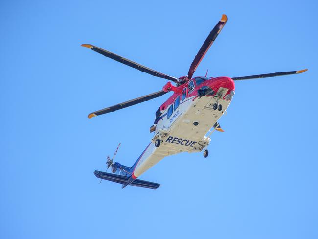 Motorcyclist flown to hospital after mining road crash