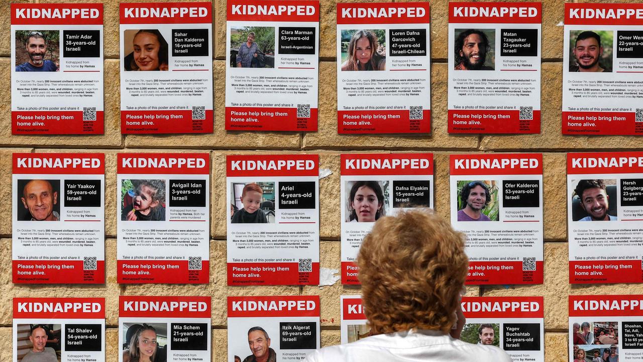 Posters showing the pictures of Israeli hostages. Picture: Ahmad Gharabli/AFP