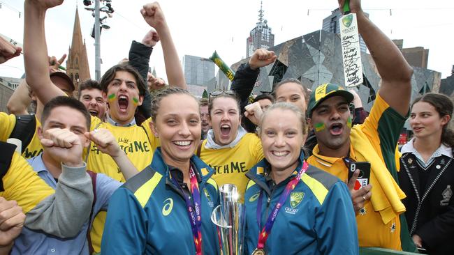 Ashleigh Gardner and Alyssa Healy with a fairly fanatical support crew.