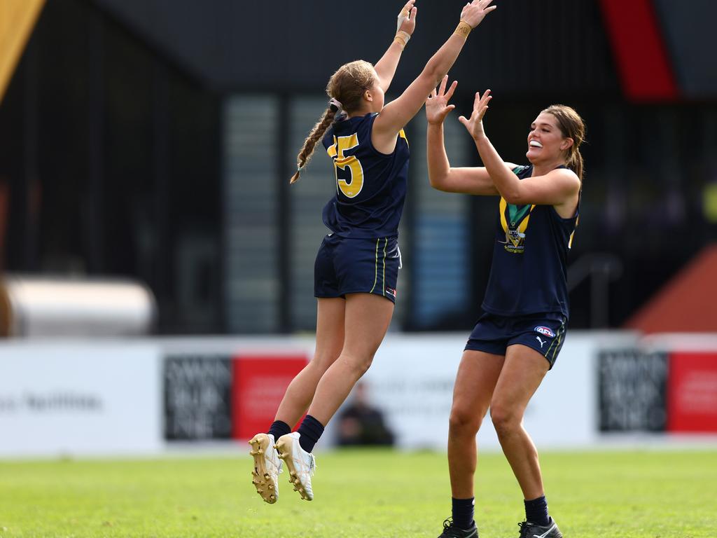 Anderson celebrates a goal with teammate Fleur Davies against the Under 23 side. Photo: Graham Denholm/AFL Photos via Getty Images.