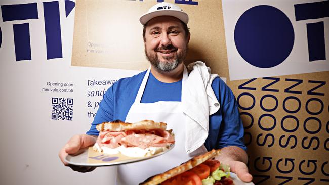 Chef Mike Eggert with some of his creations out the front of his new pizza by the slice shop, Oti, in Palings Lane, Sydney. Picture: Adam Yip