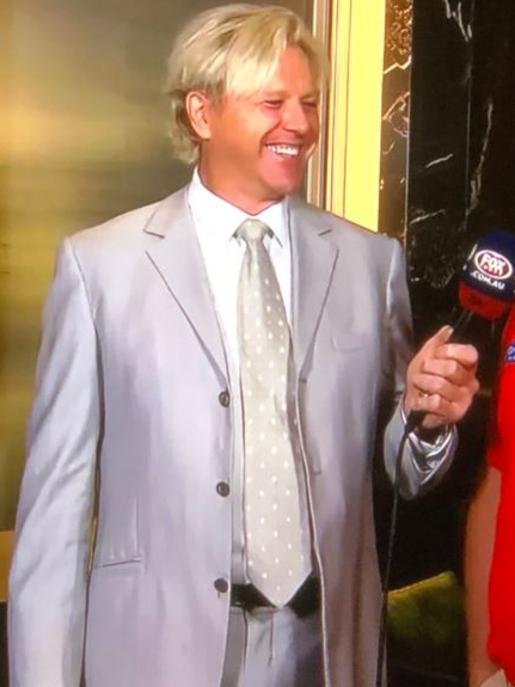 Dermott Brereton’s silver suit in Shanghai.