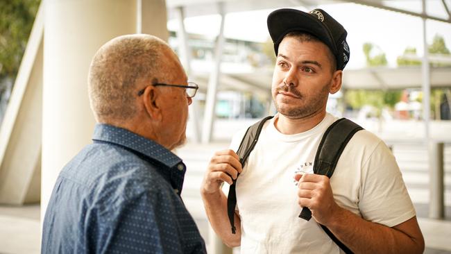 Bali fly-kicking tradie Nicholas Carr is met at Adelaide Airport. Picture: AAP/Mike Burton