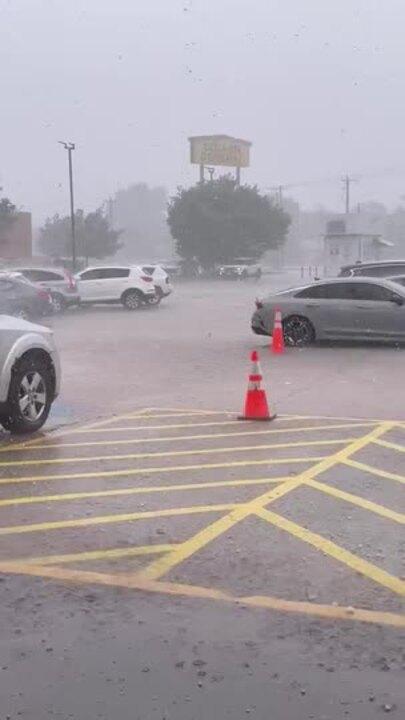 Hail Splashes Off Ground as it Hammers Fort Worth Parking Lot