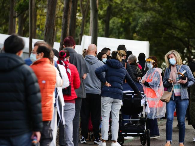 SYDNEY, AUSTRALIA - NewsWire Photos JUNE 29, 2021: Long queues of people are seen lining up to get the Covid-19 Vaccine at the Olympic Park Vaccination Hub in Sydney Australia. Picture: NCA NewsWire / Gaye Gerard