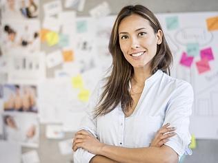 Asian woman working at a creative office